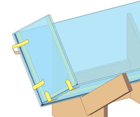 Posizionamento dello scotch per tenere le lastre ferme