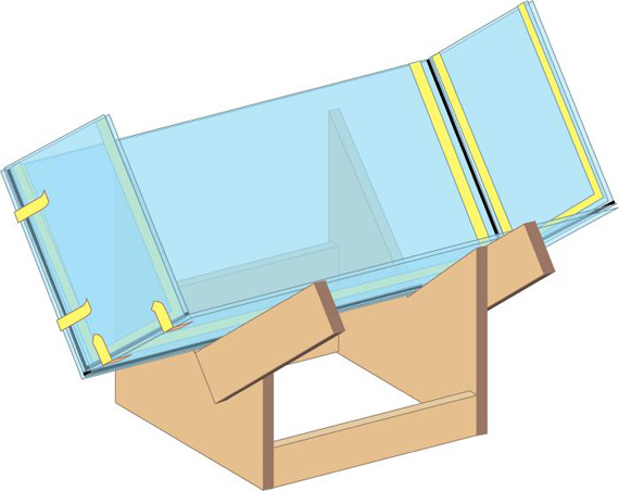 Posizionamento della quarta lastra sul supporto dell'acquario